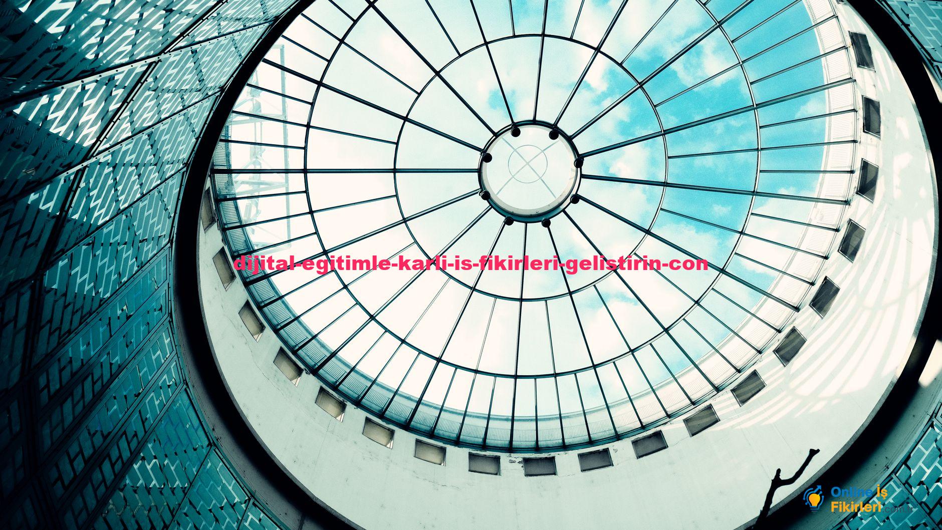 A striking view of a modern glass dome ceiling revealing the blue sky.
