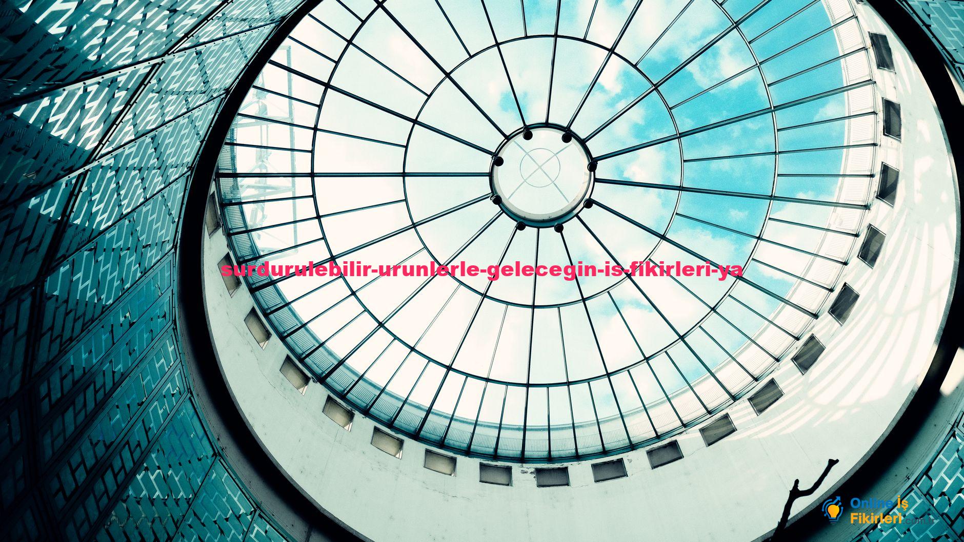 A striking view of a modern glass dome ceiling revealing the blue sky.
