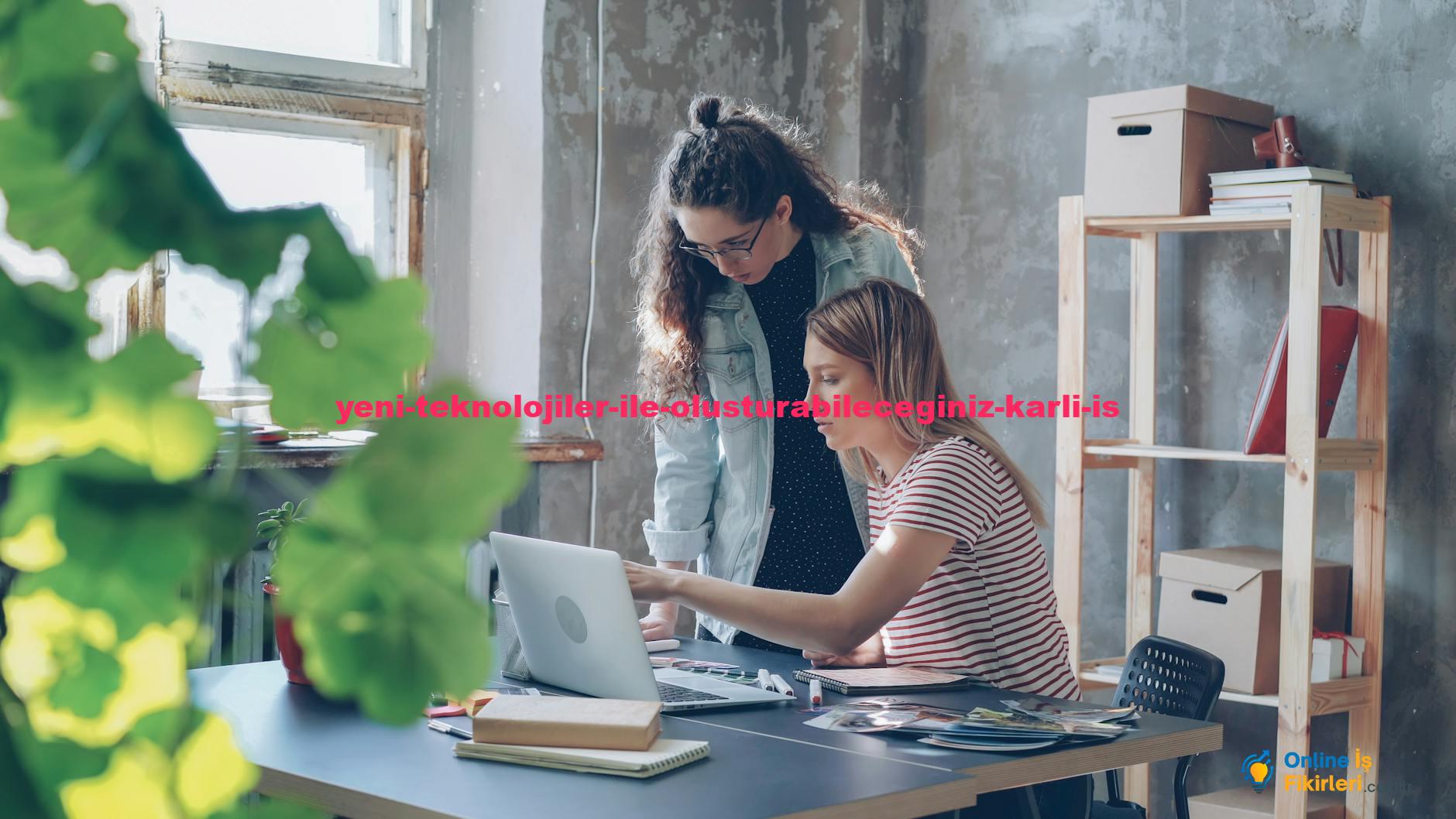 Two young women working together in a modern office with a laptop and plants.